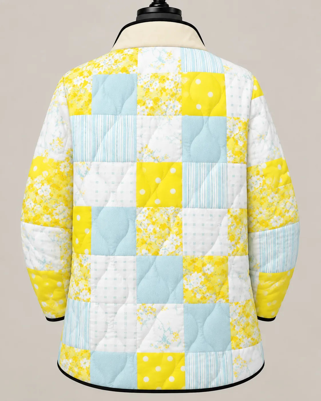 Elowen | Gesteppte Patchwork-Jacke im Sonnendesign