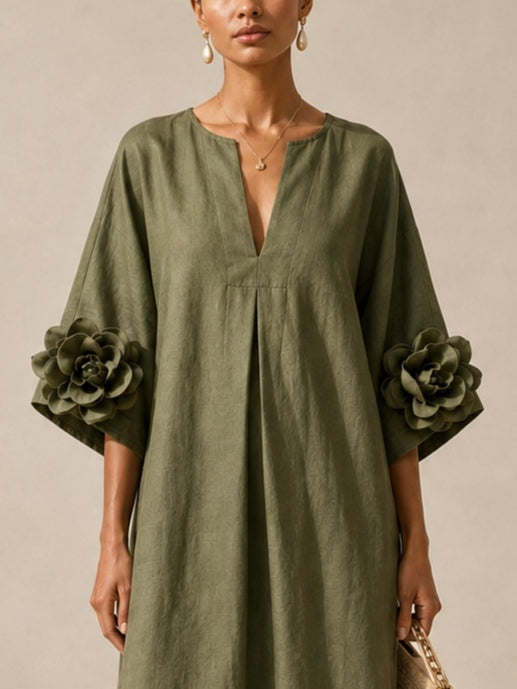 Olivgrünes Midikleid mit V-Ausschnitt und auffälligen Blumenärmeln