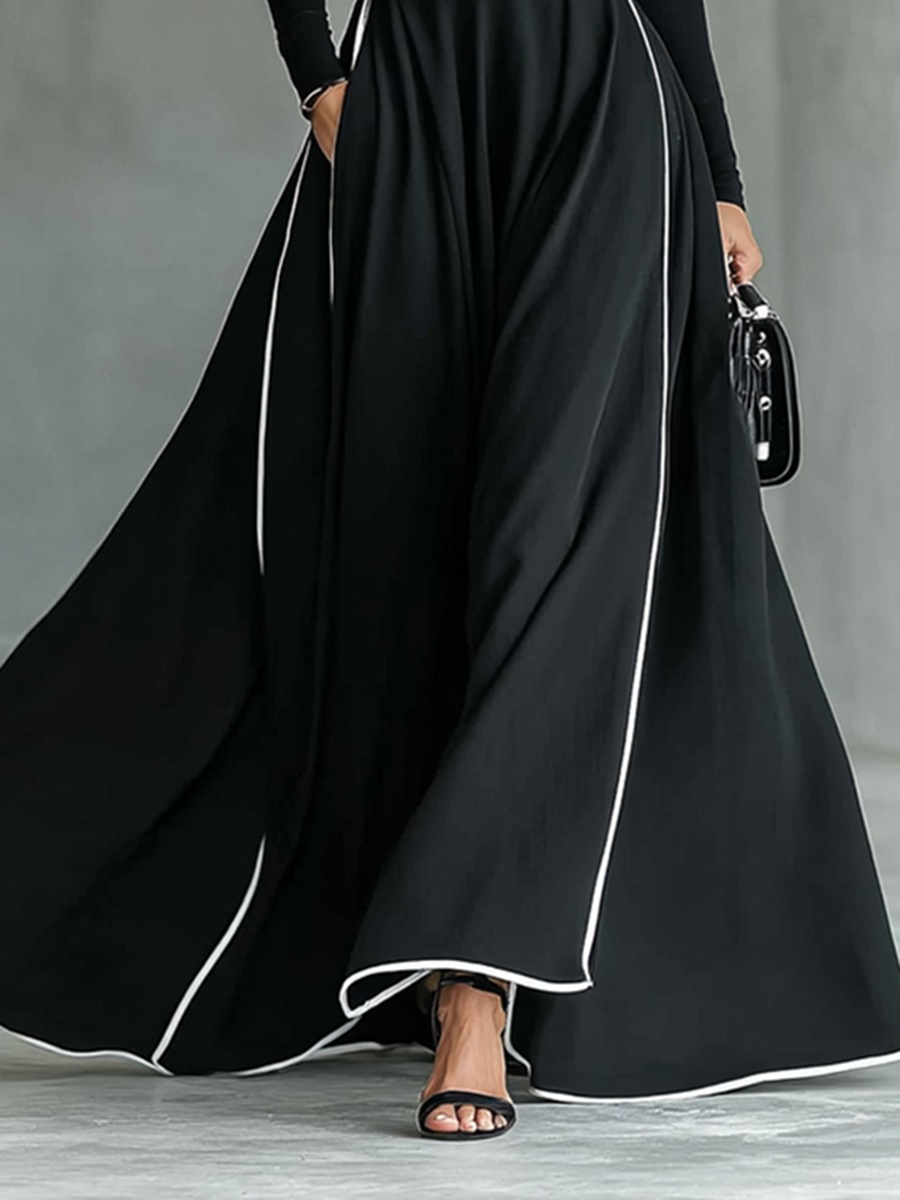Colette | Schwarzes Damen-Maxikleid mit weißen Nähten, Stehkragen, langen Ärmeln und taillierter Passform