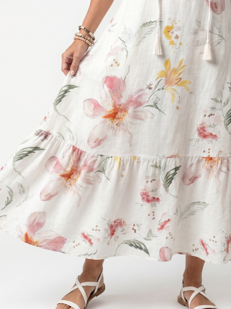 Noa | Midi-Kleid mit zarten Blumenmustern, Stufenschnitt und Quasten