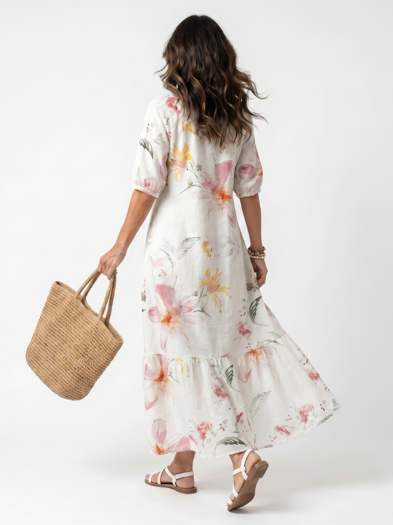 Noa | Midi-Kleid mit zarten Blumenmustern, Stufenschnitt und Quasten